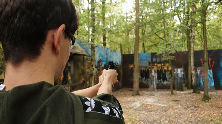 young pistol shooter in peaky pistol range